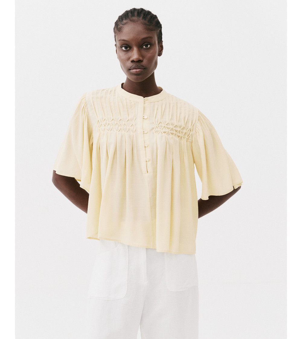 BLUSA PLISADA BOTONES
