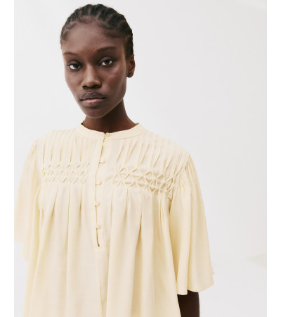BLUSA PLISADA BOTONES