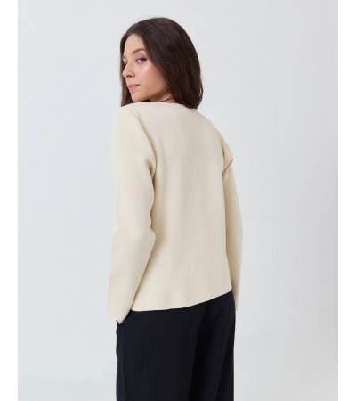 CHAQUETA DE PUNTO CON CORTE PEPLUM Y BOTONES JOYA | MULAYA