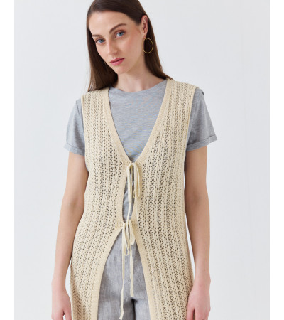 CHALECO LARGO DE PUNTO BRILLANTE CON LAZADA | MULAYA