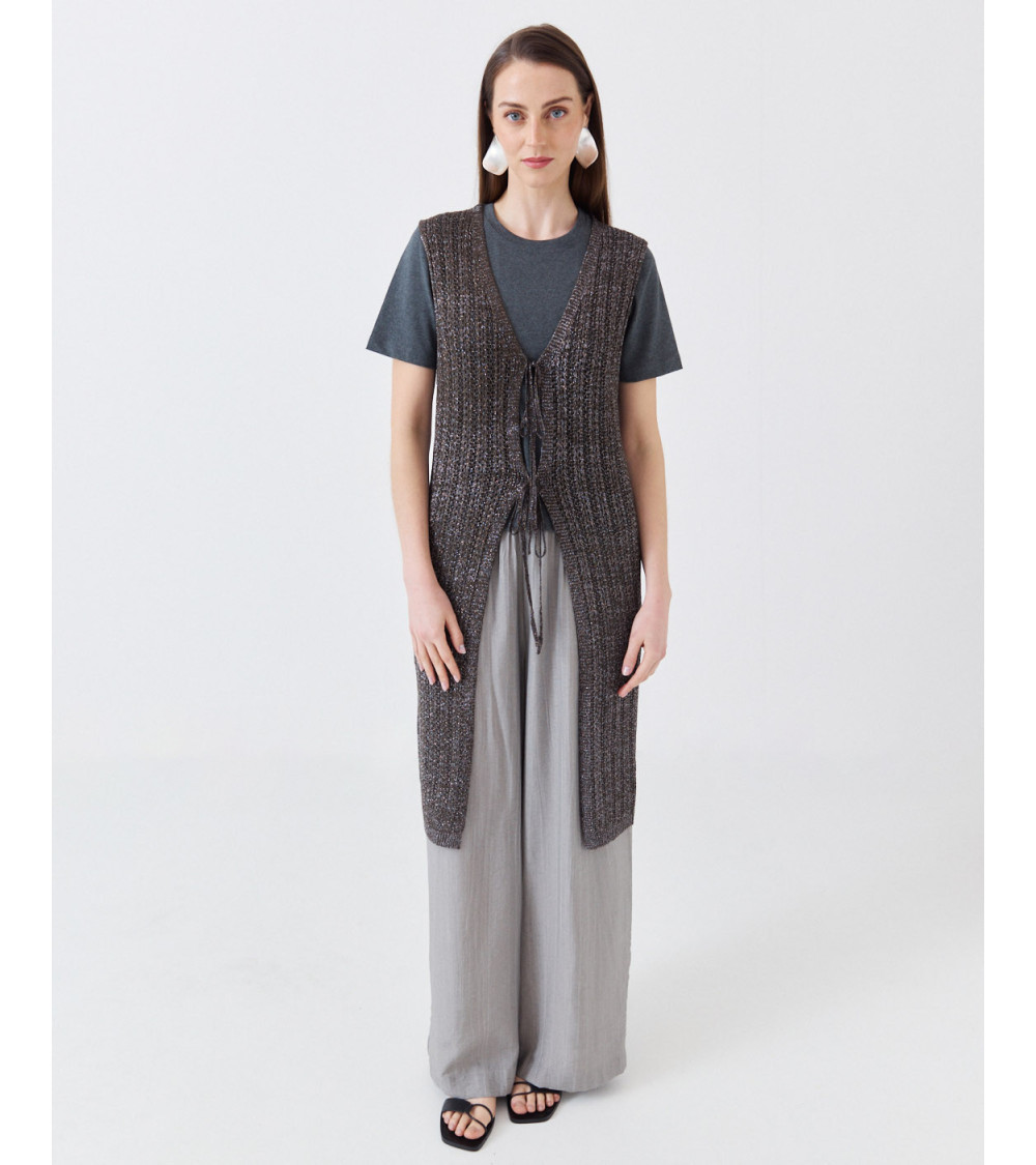 CHALECO LARGO DE PUNTO BRILLANTE CON LAZADA | MULAYA