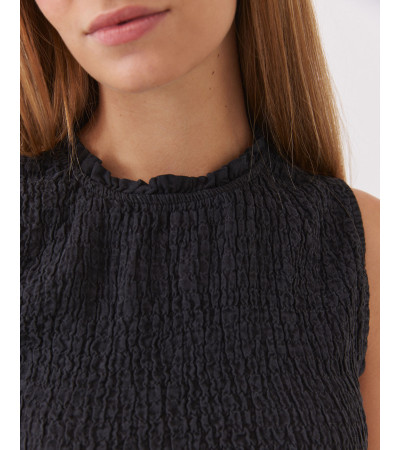 TOP NIDO DE ABEJA CON CUELLO VOLANTES Y CORTE PEPLUM | MULAYA