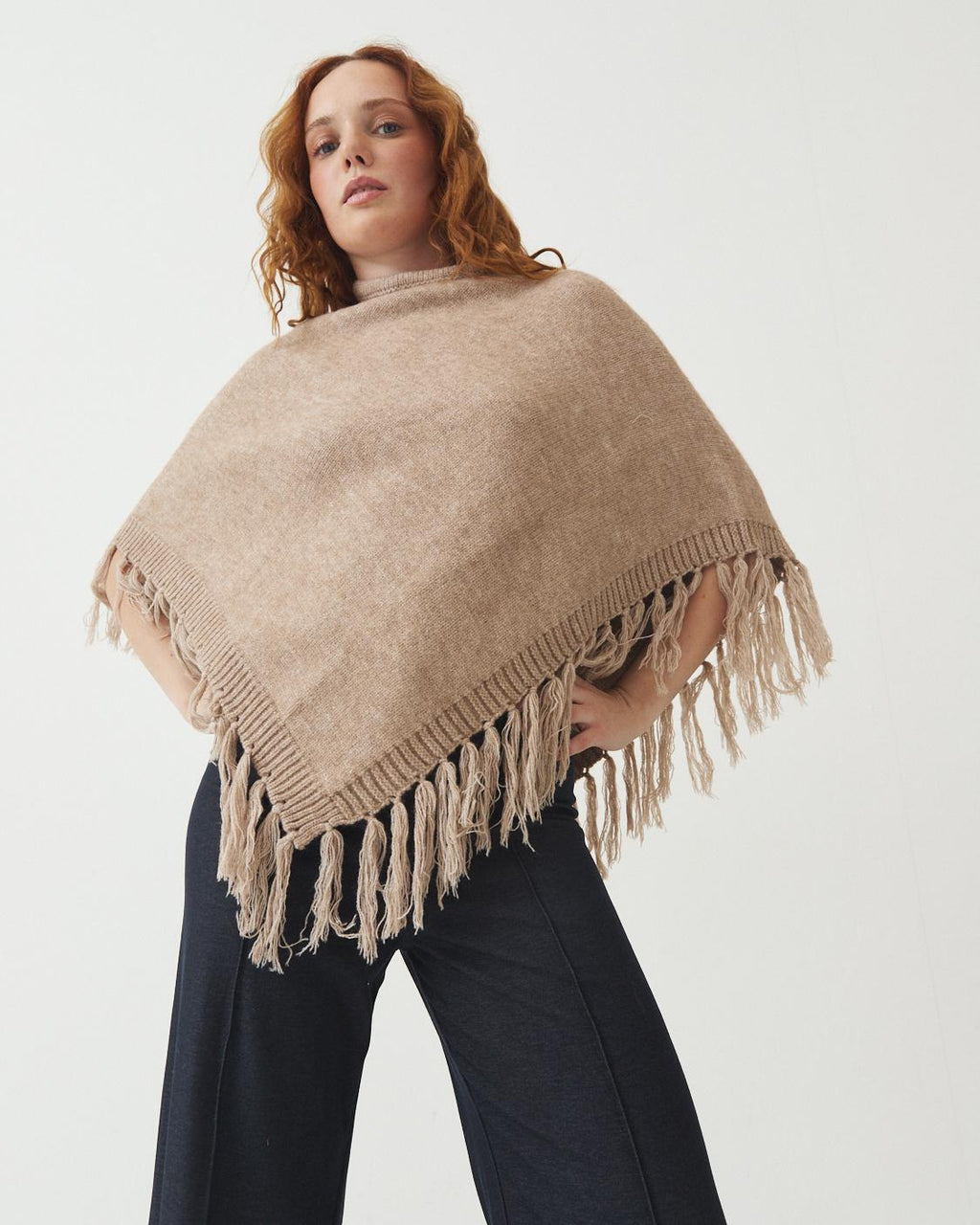 PONCHO ASIMETRICO CON FLECOS