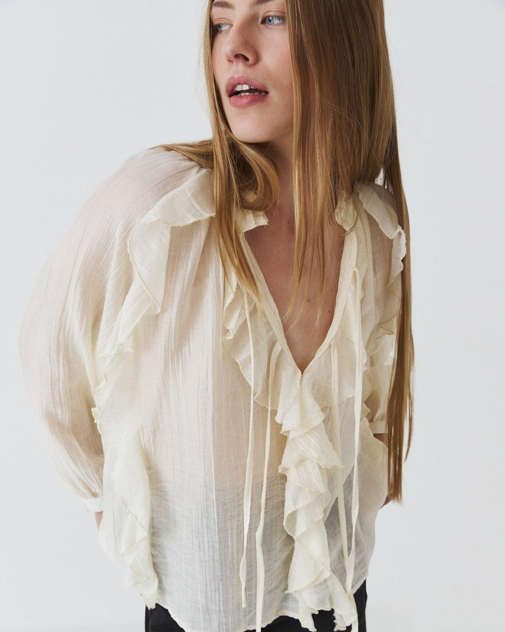 SEMI-SHEER RUFFLED BLOUSE