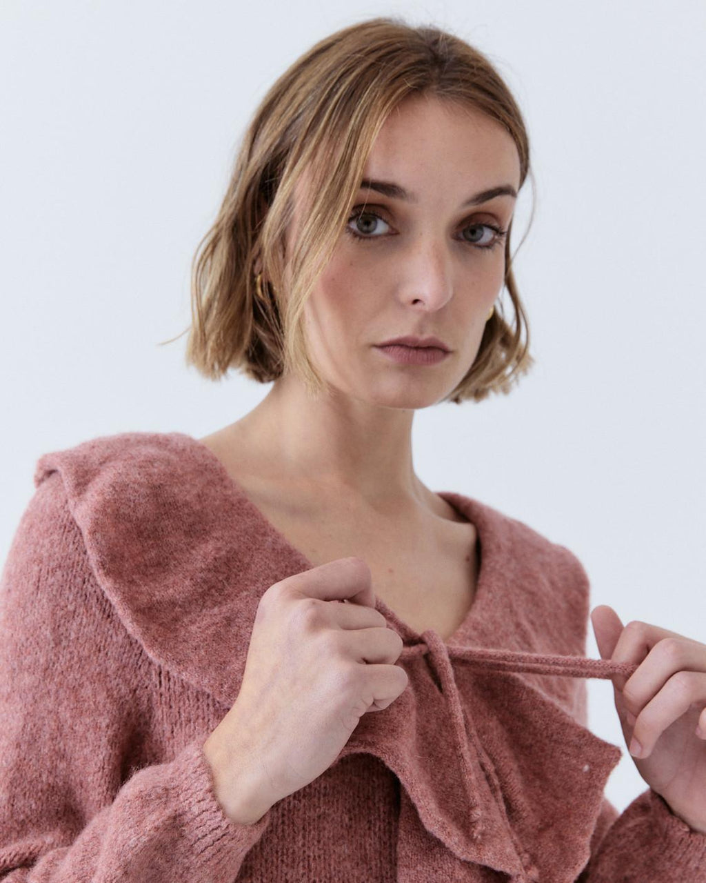 RUFFLED KNIT SWEATER