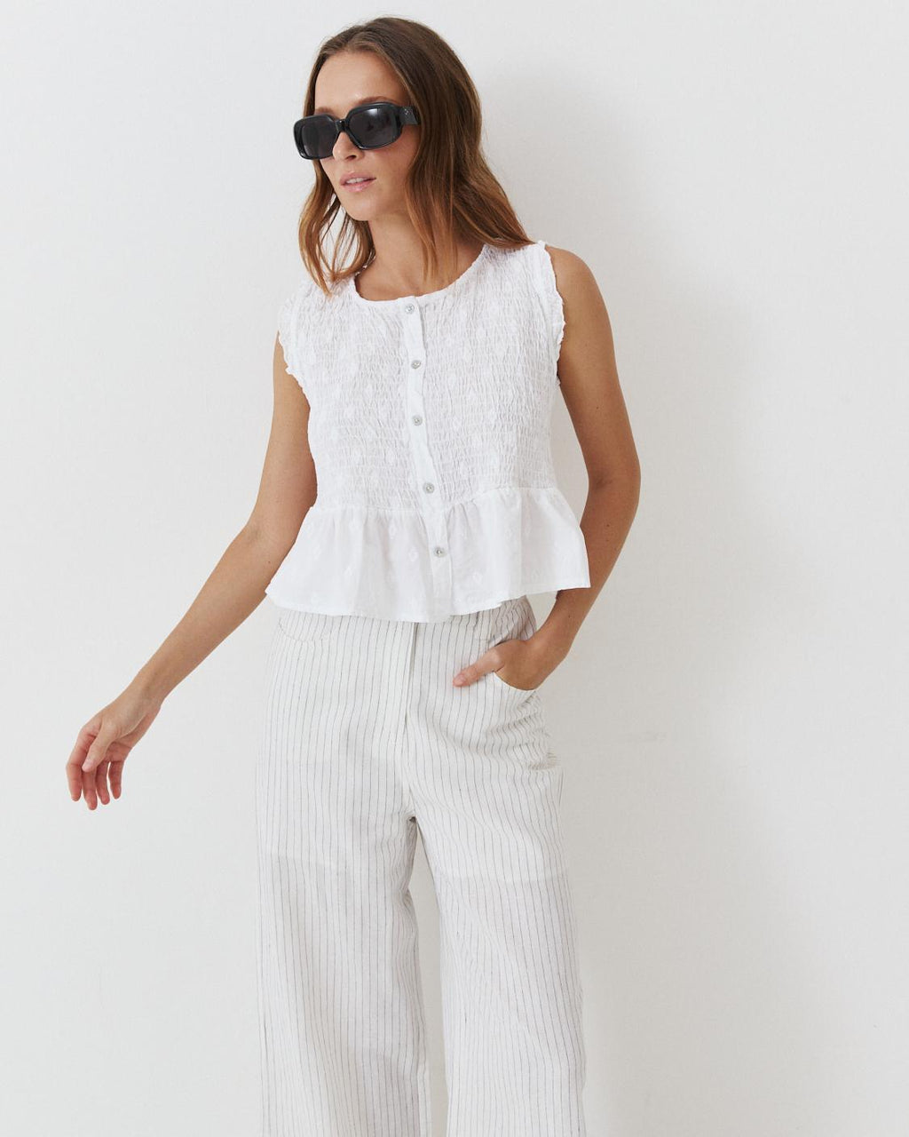 TOP NIDO ABEJA PEPLUM BORDADO
