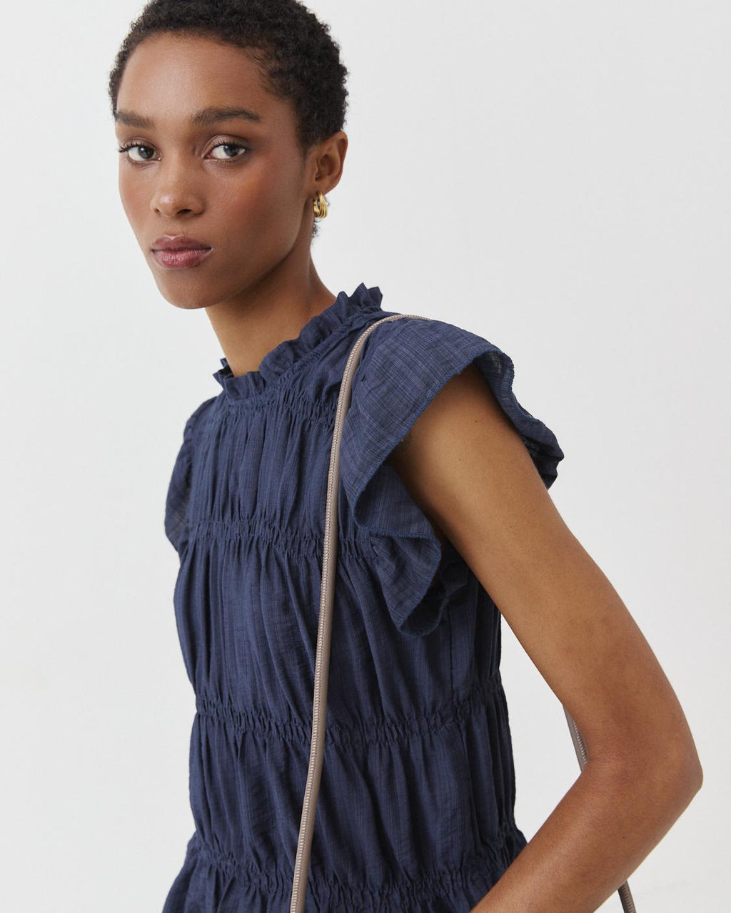 RUFFLED SLEEVELESS TOP