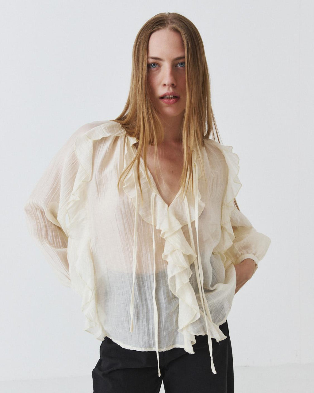 SEMI-SHEER RUFFLED BLOUSE