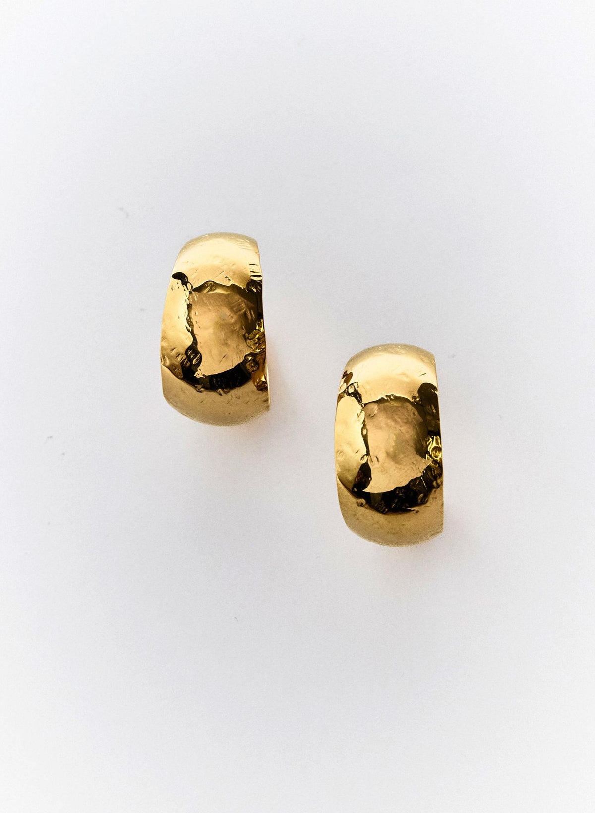 PENDIENTES AROS SUPERFICIE TEXTURA
