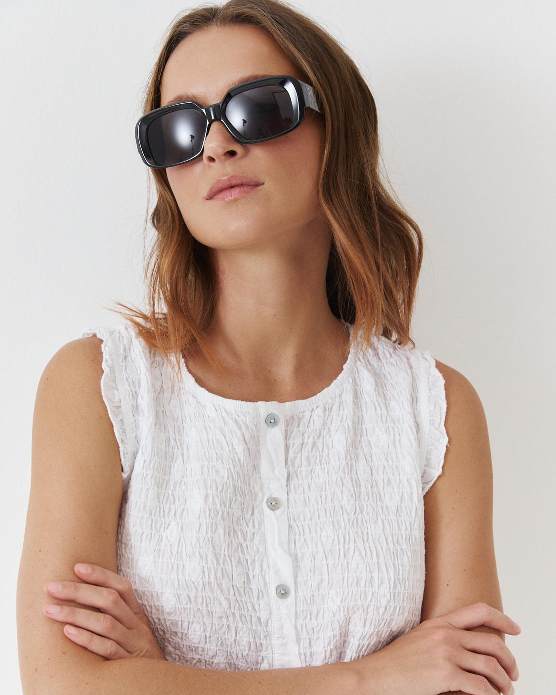 EMBROIDERED SMOCKED PEPLUM TOP