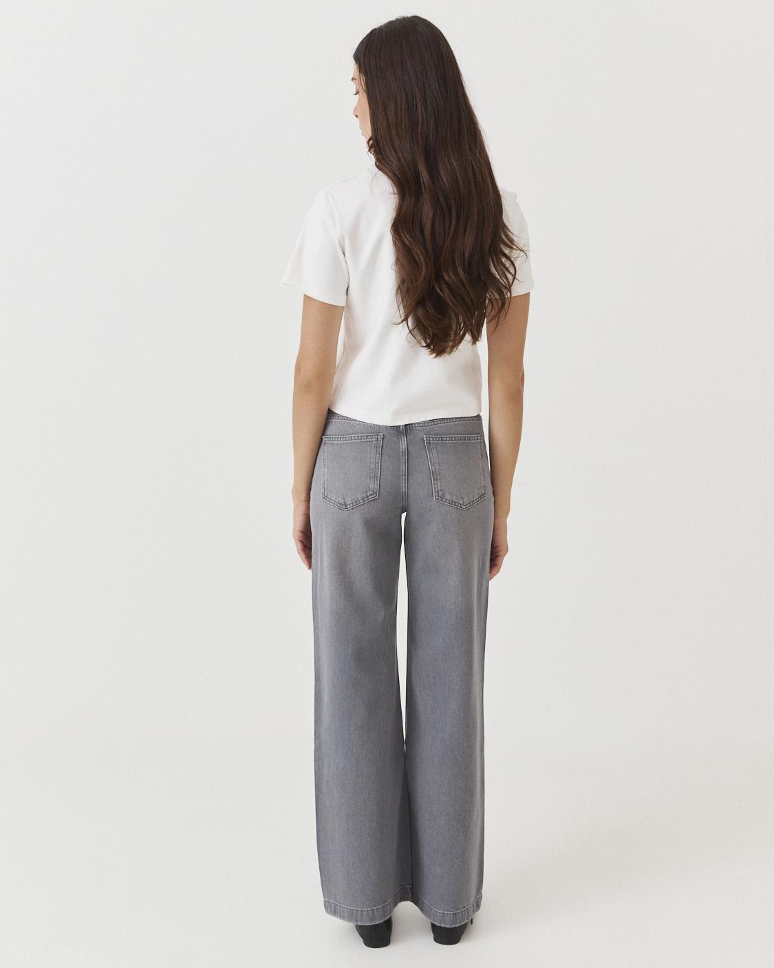 WIDE LEG JEANS WITH GEOMETRIC POCKETS