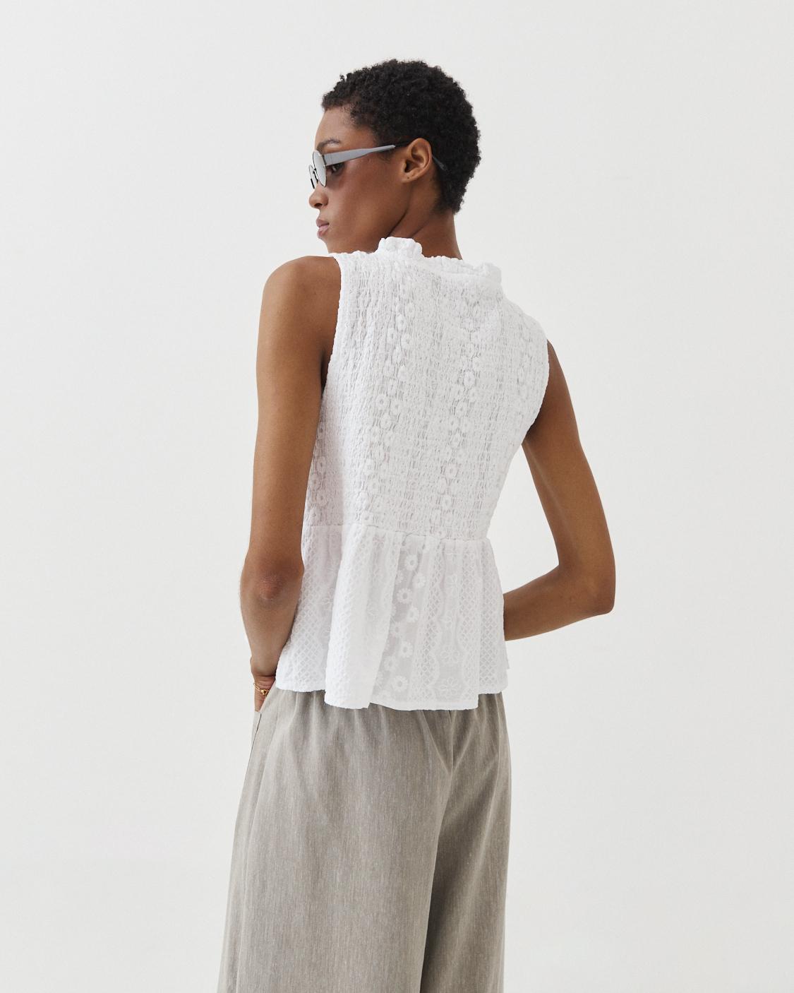 TOP NIDO ABEJA PEPLUM BORDADO