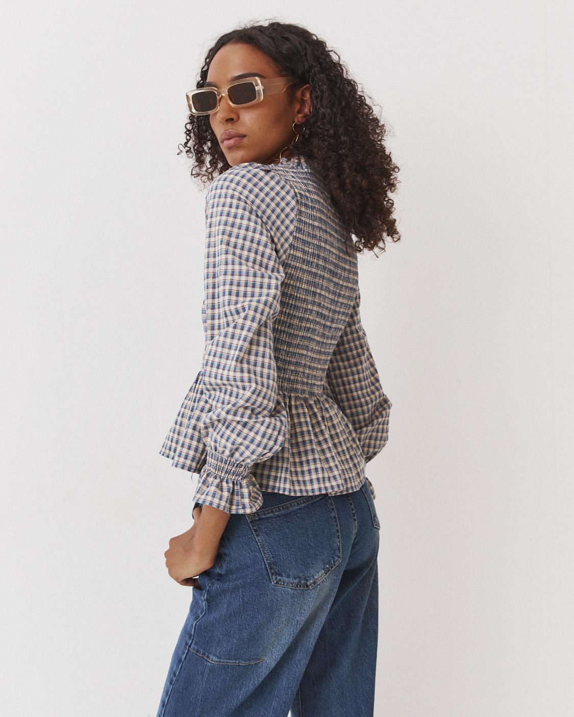 BLUSA NIDO ABEJA PEPLUM