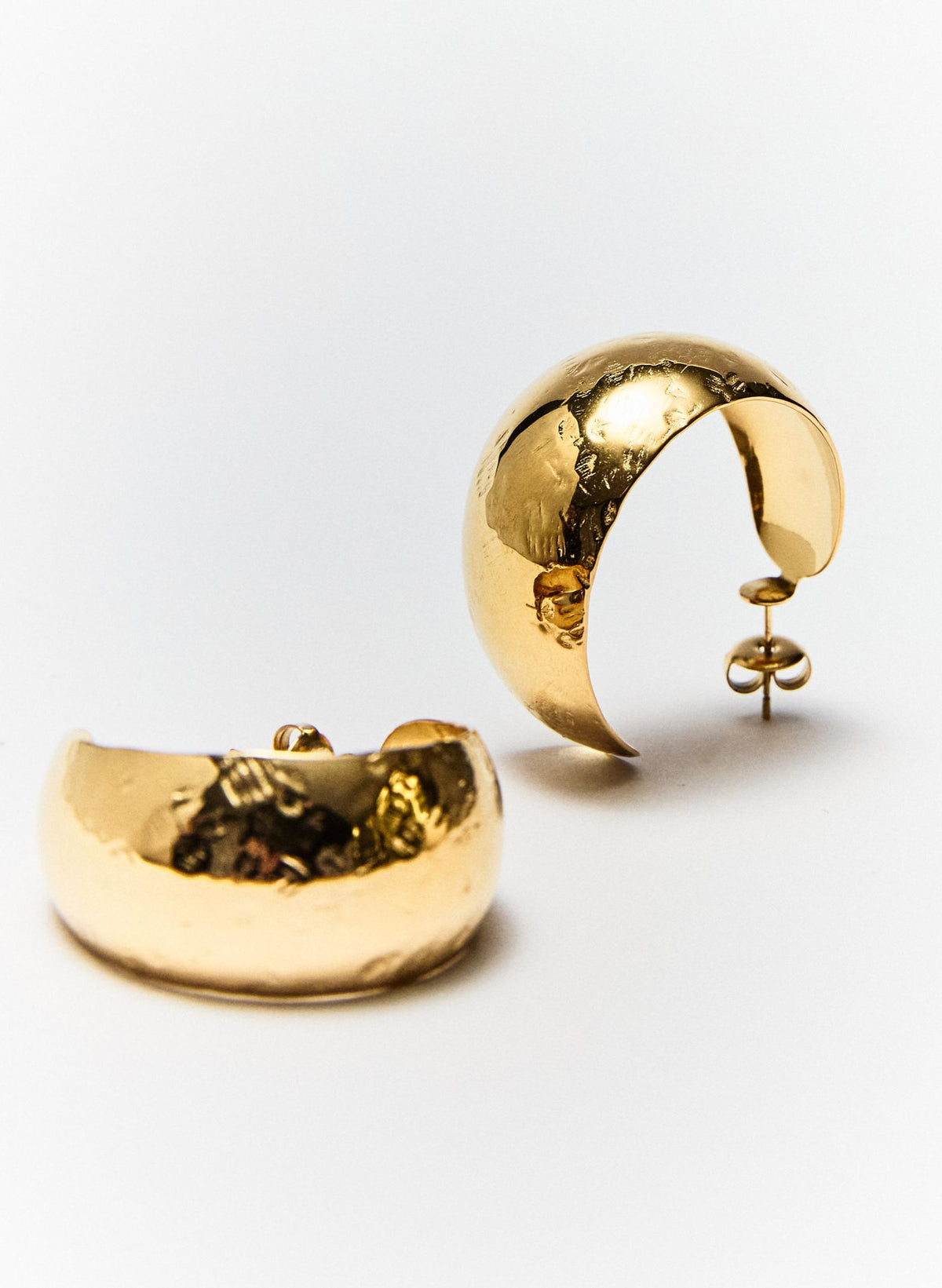PENDIENTES AROS SUPERFICIE TEXTURA