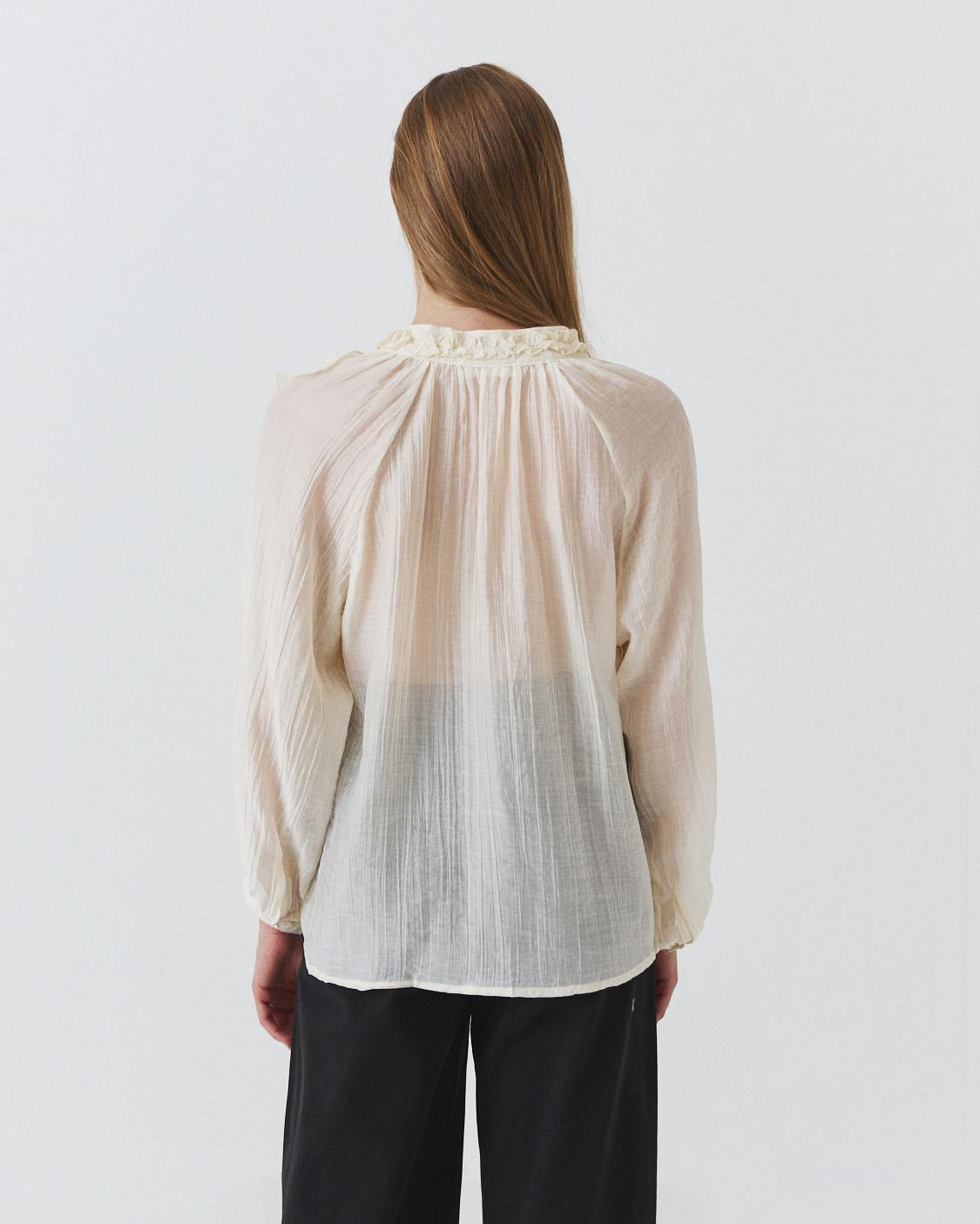 BLUSA SEMITRANSPARENTE VOLANTES